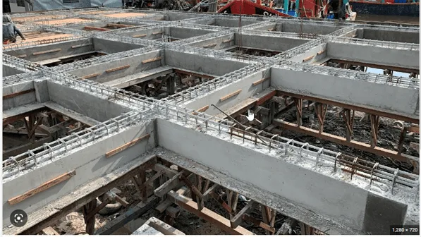 A RCC beam is a structural member designed to resist bending and shear forces along with supporting loads. The beam is made of a concrete that has been reinforced with steel bars or mesh, increasing the structure's tensile strength and enabling it to withstand bending and shear pressures.