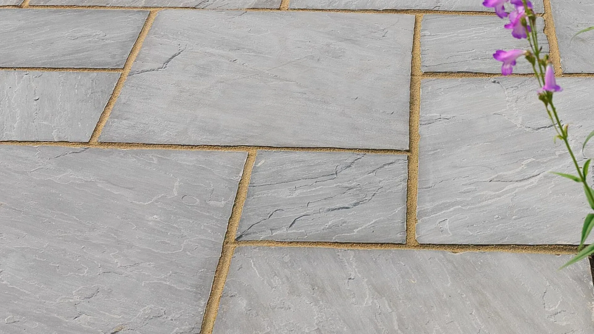Patio jointing refers to the sand or fine aggregate filled into the joints between paving stones, bricks, or concrete pavers to lock the whole surface together. patio jointing