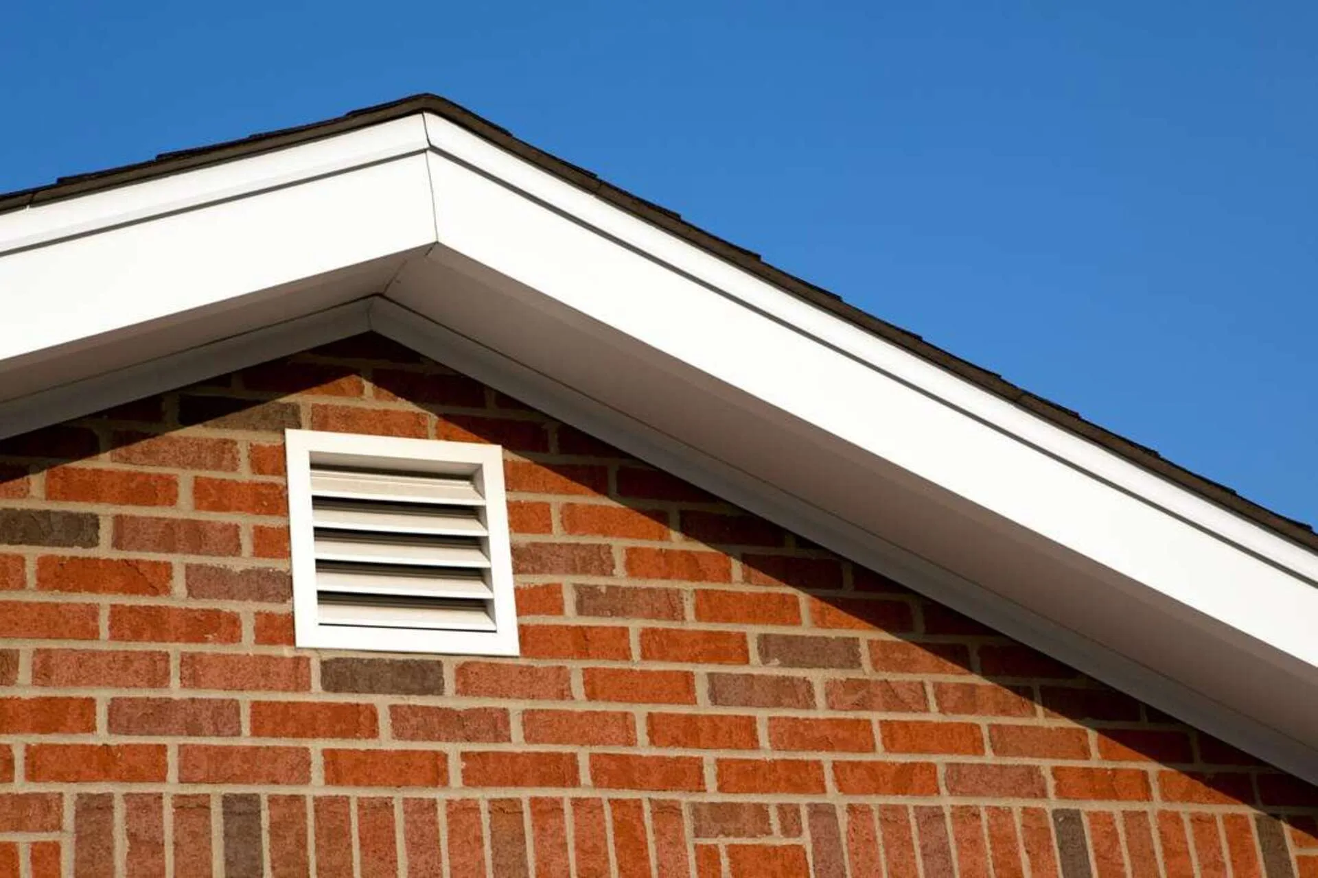 This article explores core design considerations balancing aesthetics, practicality, and longevity when planning gable roof buildings. Blog GettyImages 177050785