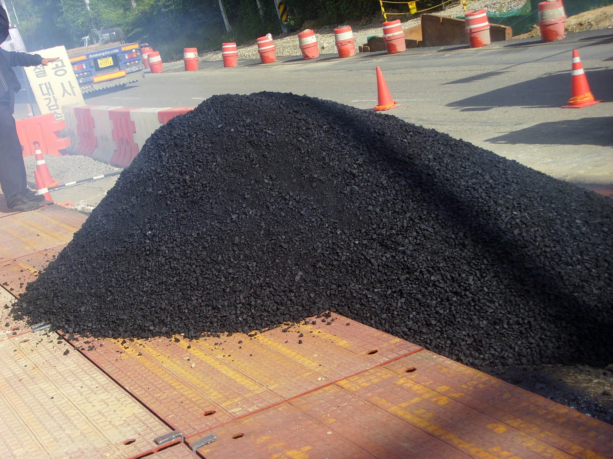 The term "bituminous concrete" comes from the naturally occurring hydrocarbon bitumen used to make the asphalt cement binder. BITUMINOUS CONCRETE