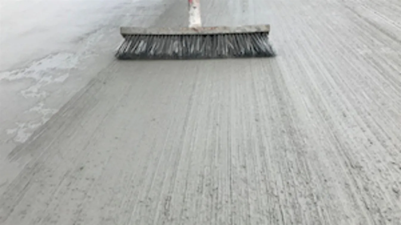 A concrete patio refers to an outdoor living space created using a poured concrete slab as the floor surface. concrete patio-broom finish