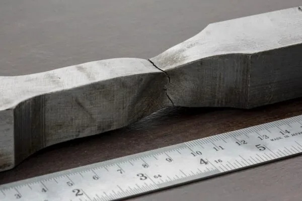 The ultimate tensile strength (UTS) of a material defines its maximum resistance to breakage from applied tensile loads. ultimate tensile strength